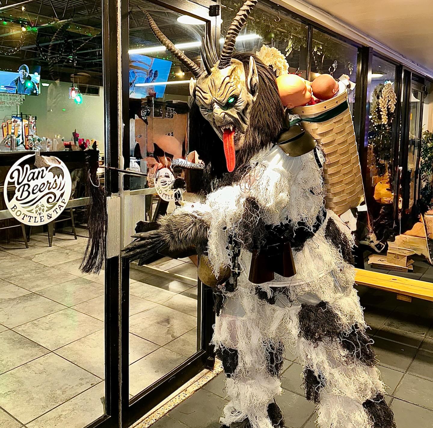 Costumed Krampus character at Van Beers Bottle & Tap in Melbourne FL during a themed craft beer event