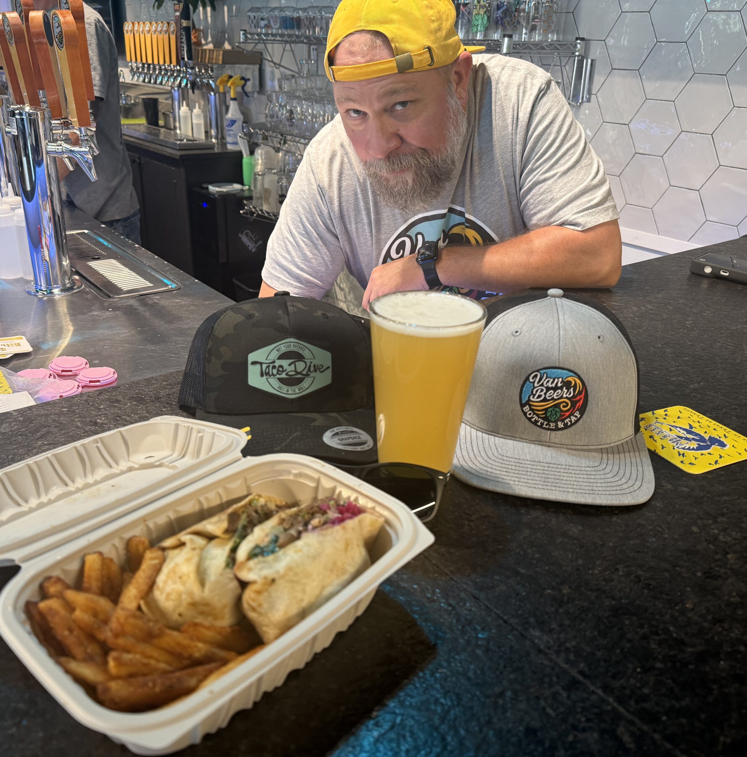 Craft beer with tacos at Van Beers Bottle & Tap in Downtown Melbourne, Florida — outside food welcome.