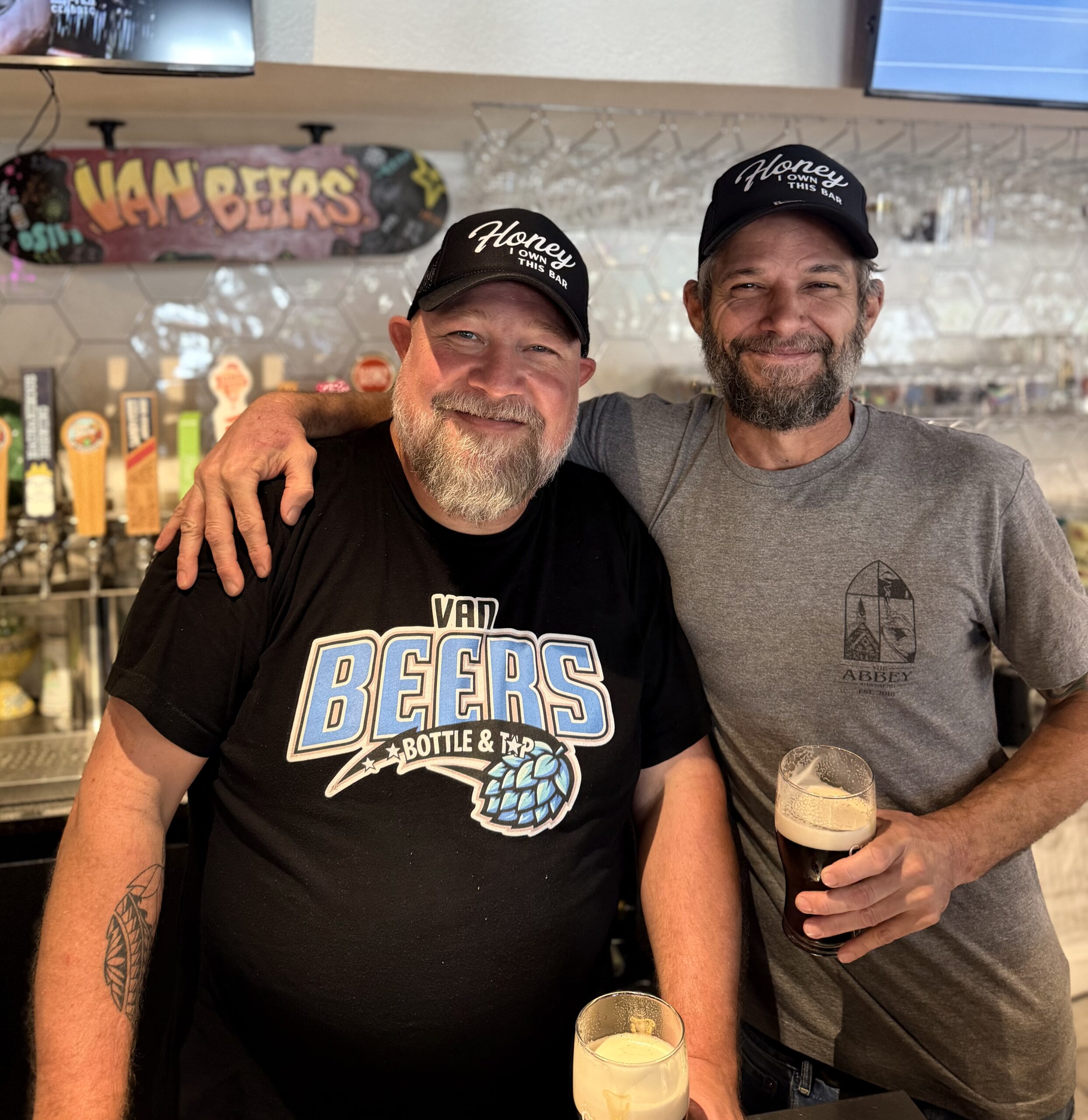 Jay and Glenn, owners of Van Beers Bottle & Tap, inside their craft beer taproom in Downtown Melbourne Florida
